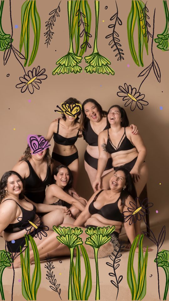Women laughing out loud together in black underwear, framed by hand-drawn flowers
